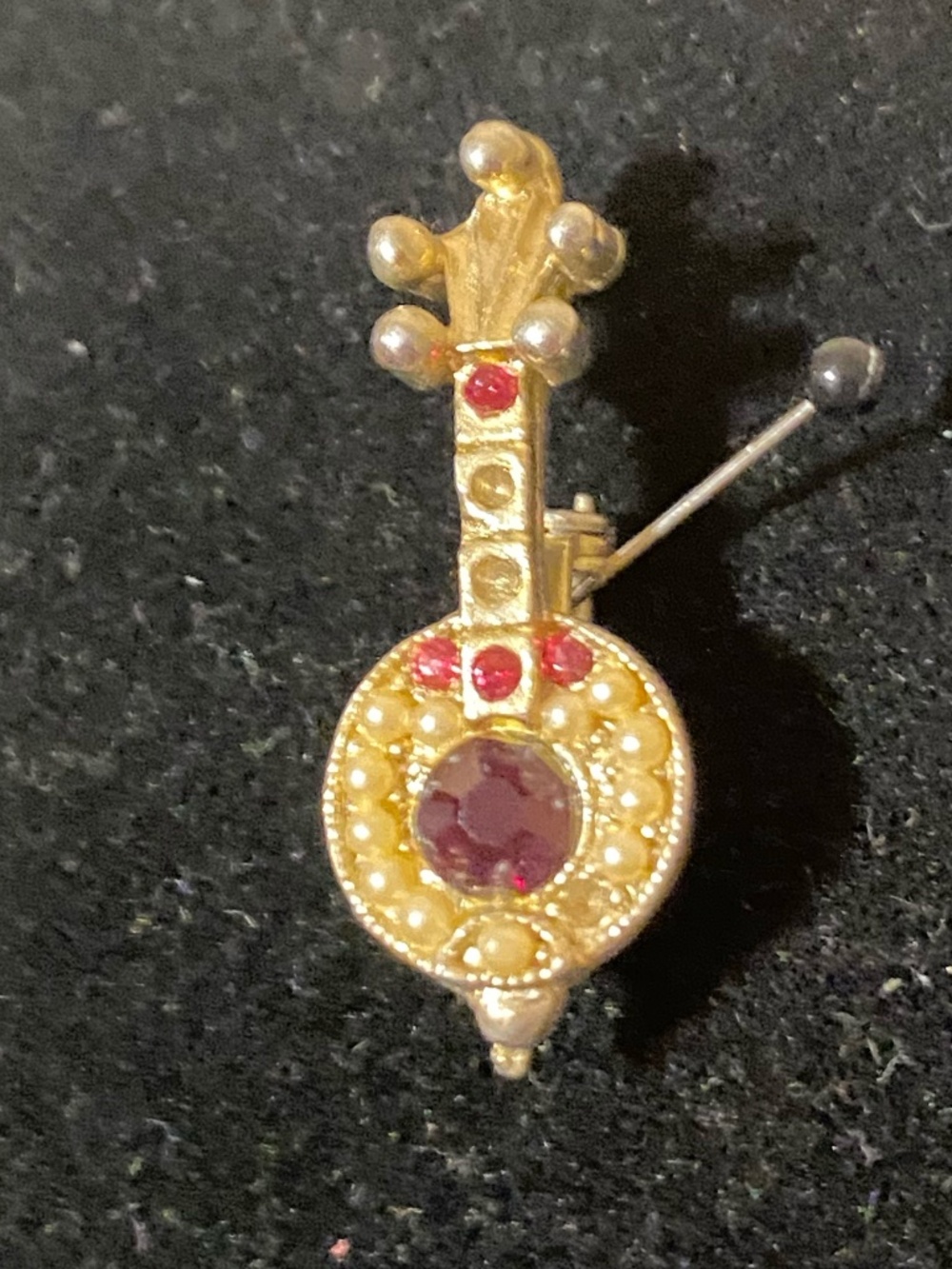 the tiniest musical brooch